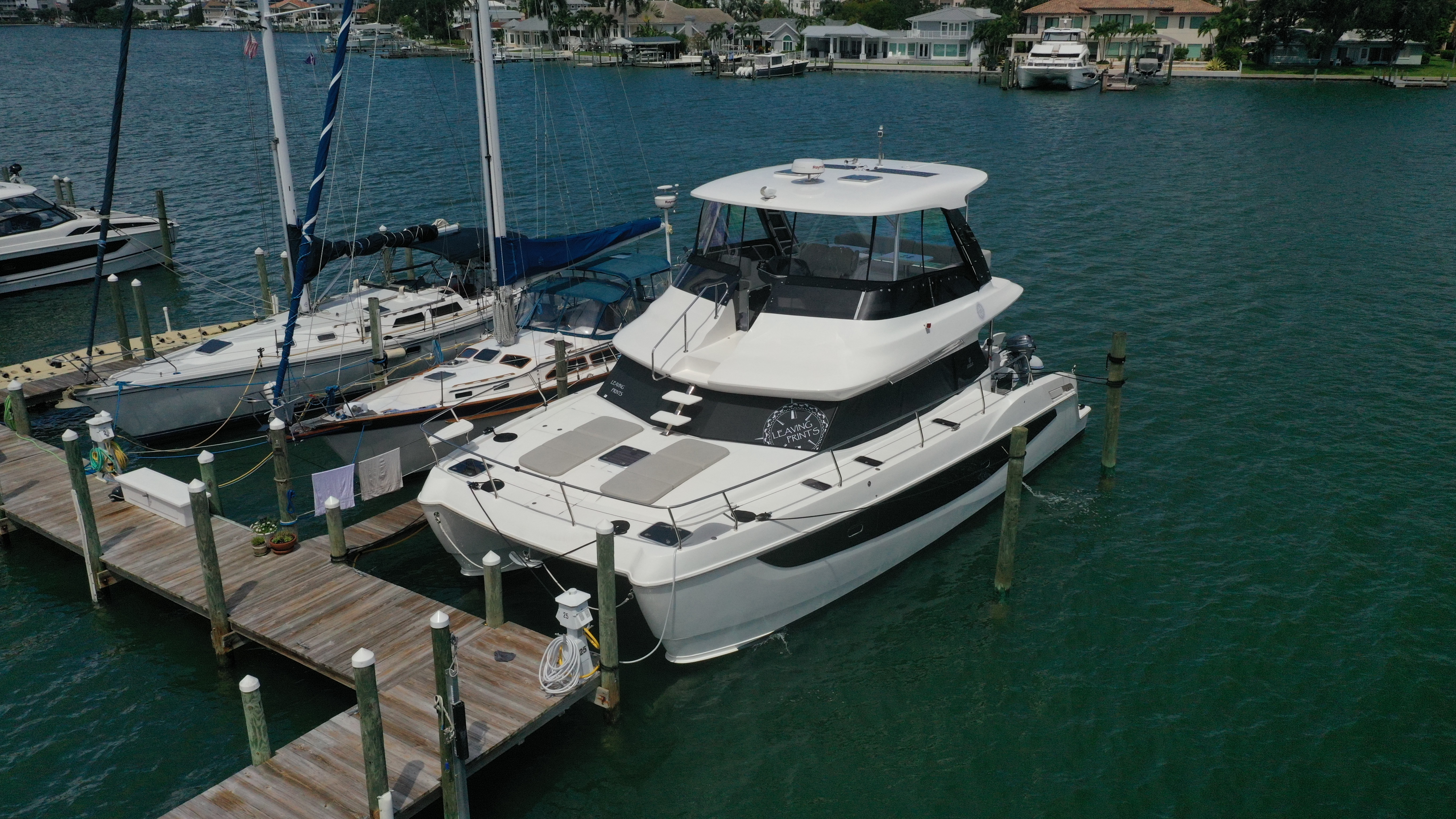 Exploring Aquila Power Catamarans: Models, Features, and Enhancements with Magne Shade's Patented Sunshades